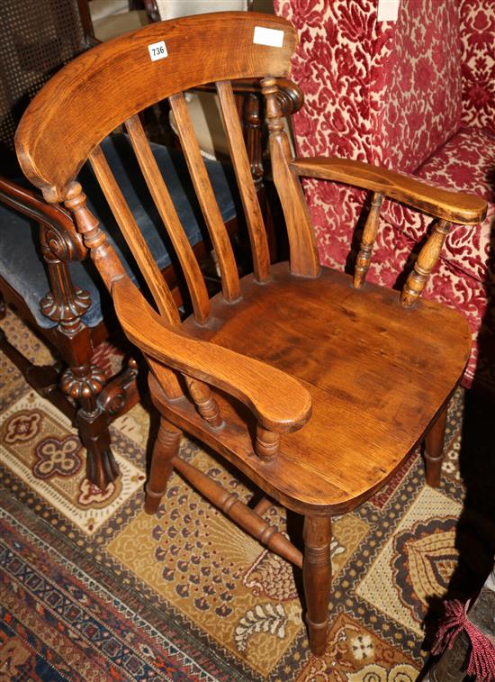 A Victorian beech lathe back elbow chair